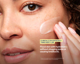 Close-up of a woman's face with a translucent gel cushion being applied to her cheek by a hand with manicured nails. Text on the image reads 'Clinically validated by a third-party lab' and 'Flood skin with hydration—without clogging pores or causing breakouts.