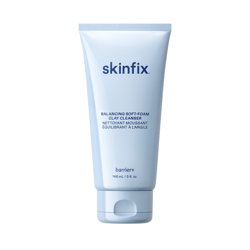 Skinfix Balancing Soft-Foam Clay Cleanser tube, 148 mL, in light blue packaging with navy text, on a transparent background.