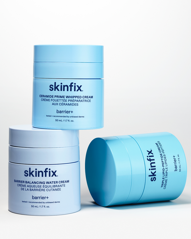 Three light blue skincare jars from the brand skinfix on a clean white background. The products include Ceramide Prime Whipped Cream, Triple Lipid-Peptide Cream, and Barrier Balancing Water Cream, all in 50 mL sizes.