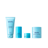 Four Skinfix skincare products in a row: Hydrating Foaming Oil Cleanser, Exo + Ectoin Intensive Repair Baume, Triple Lipid Eye Treatment and Triple Lipid-Peptide Cream on transparent background.