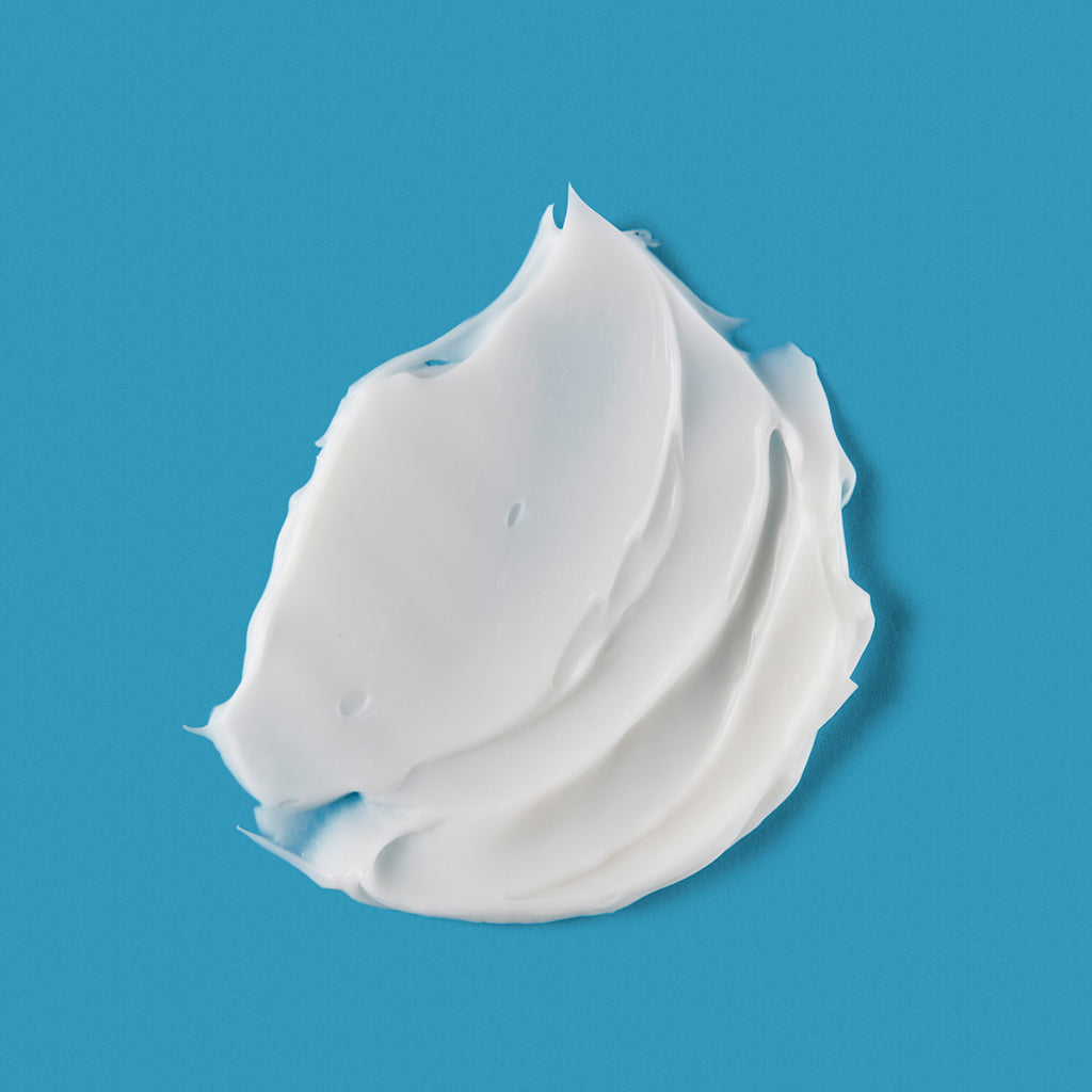 Barrier+ Lipid-Boost Body Cream texture blue background